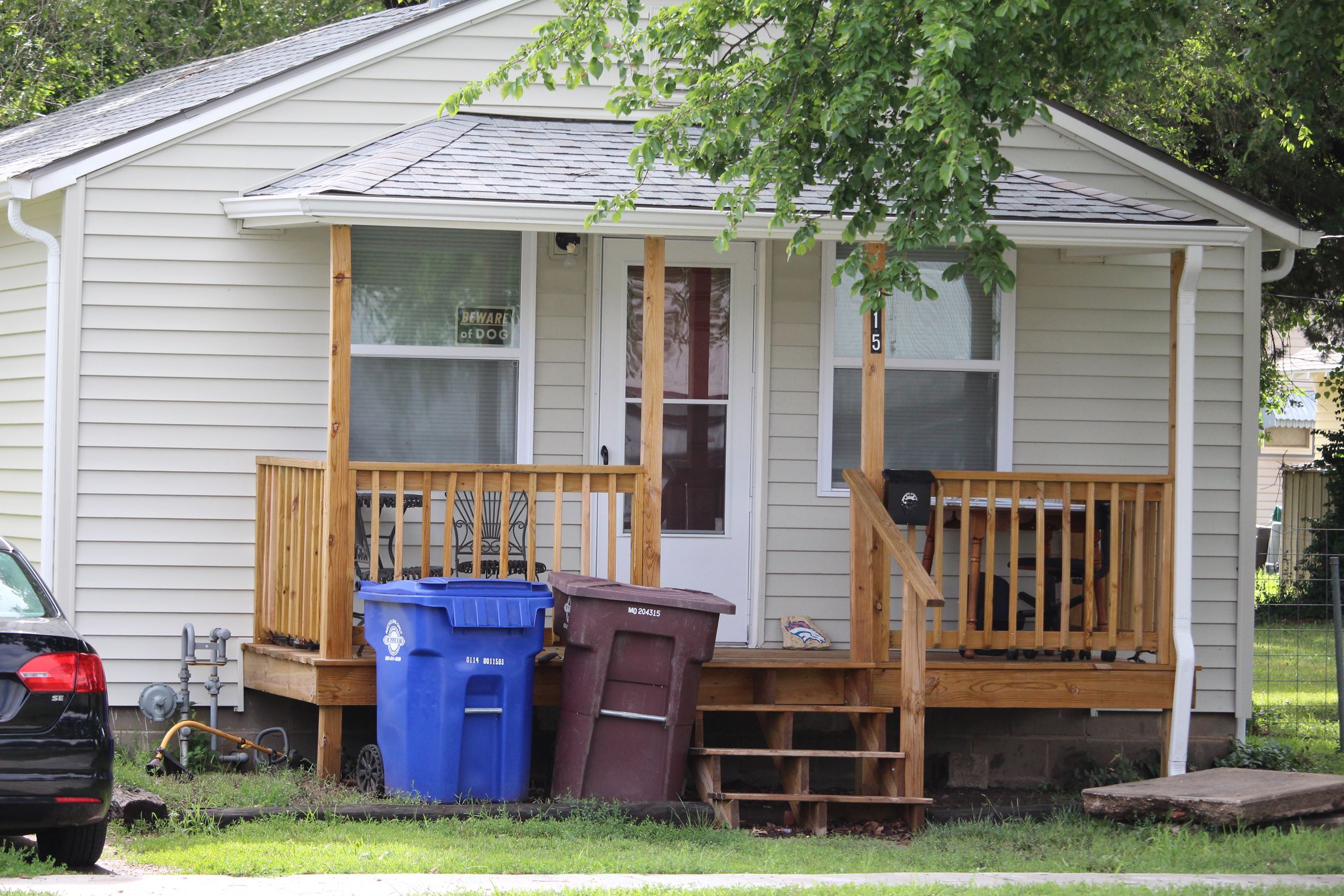 Remodeled one-story home with cream-colored siding