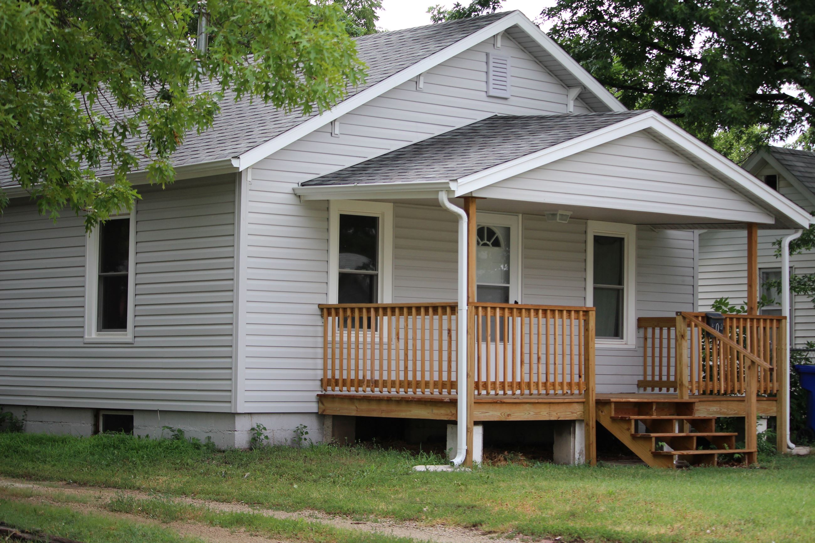 Remodeled one story home with gray siding