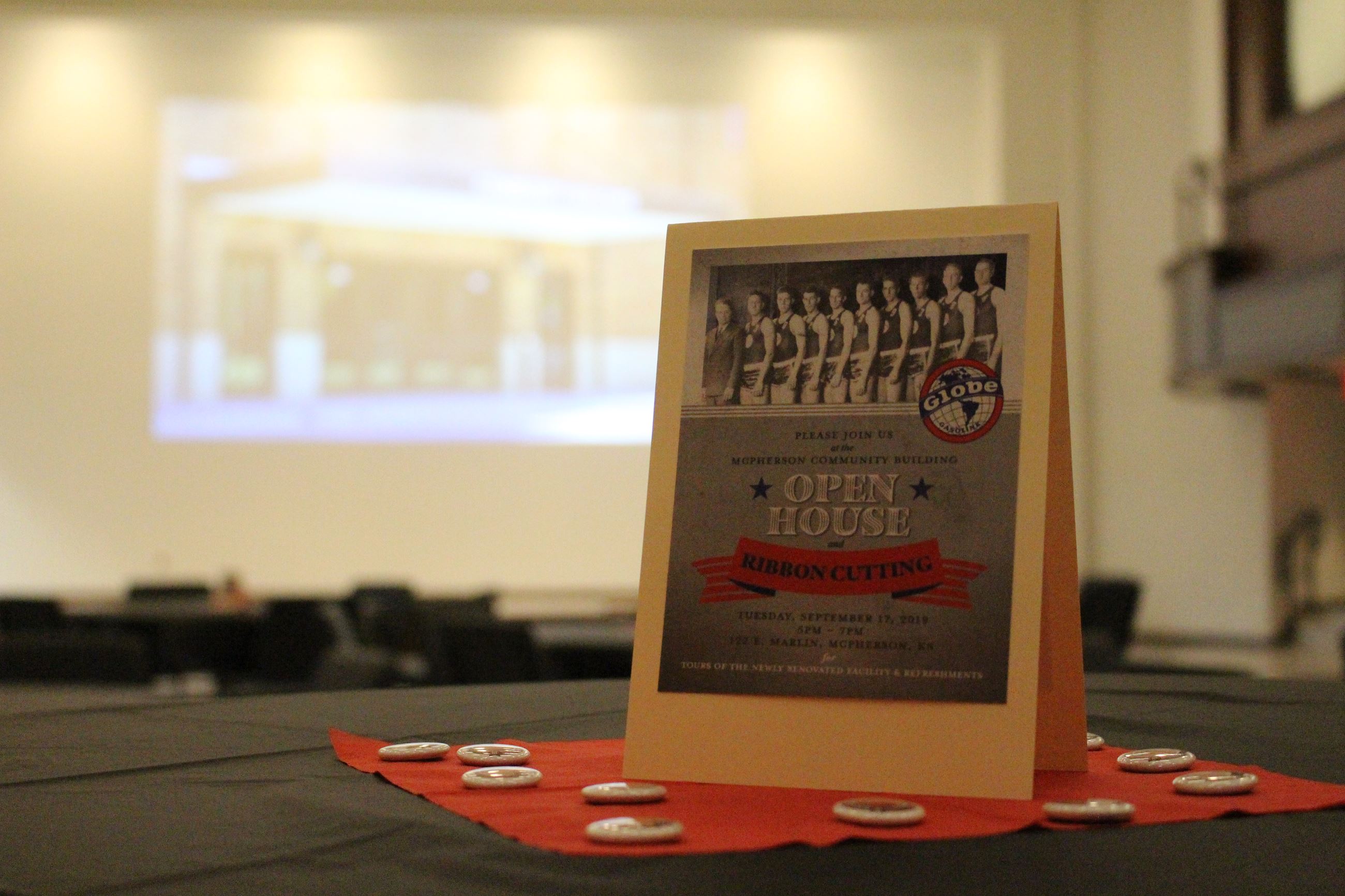Table decoration featuring the McPherson Globe Refiners basketball team used for the community build