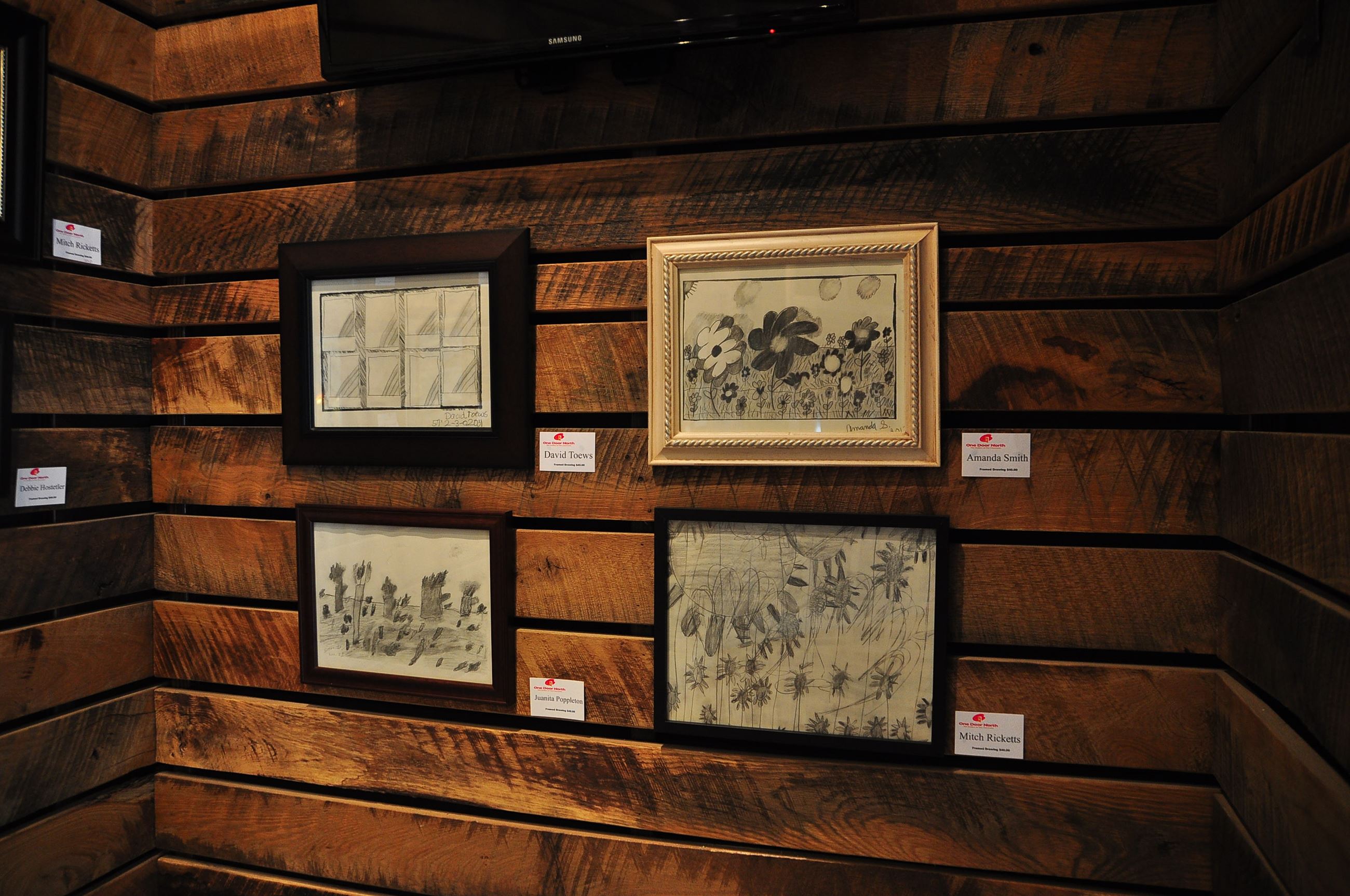 Art displayed in the One Door North Gallery.